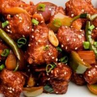 Chili Chicken (G) · Succulent chunks of chicken cooked with in a delicious chili soy garlic sauce with onions an...