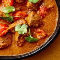 Lamb Rogan Josh: Lamb Curry (G) · Cubes of premium Australian Lamb simmered with Indian spices in our tomato-onion-ginger-garl...