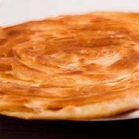 Laccha Paratha  · Layered whole wheat bread cooked in tandoor.