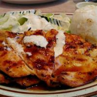 Teriyaki Chicken · Grilled chicken breast topped with our home made teriyaki sauce served with salad and rice.