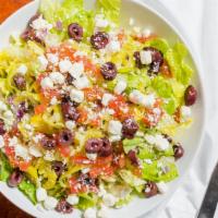 Greek Salad · Lettuce, red onions, kalamata olives, roma tomatoes, feta cheese, oregano, imported sliced y...