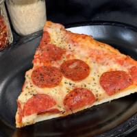 Pepperoni Pizza Slice · Enjoy a large slice of thick crust pepperoni pizza with homemade marinara sauce and real moz...