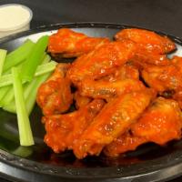 Hot Wings (12 Pcs) · 12 Spicy Hot Wings served with celery and ranch dressing