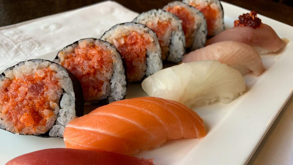 Sushi Dinner  · Spicy tuna roll and Tuna Yellowtail Salmon Halibut Albacore nigiri sushi are 1 piece each. 
Miso soup and green salad