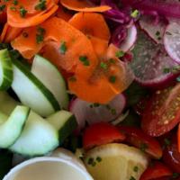 Simple Salad · Lettuces, carrots, radish, cucumber, tomato, and citrus vinaigrette.