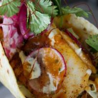 Ultimate Fish Taco · One GIANT fish taco on a toasted flour tortilla with cabbage, awesome sauce, jersey sauce, a...