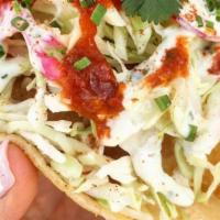 Street Taco · Grilled cobia or fried hoki fish on a corn tortilla with cabbage, awesome sauce, jersey sauc...