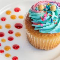 Sprinkle · Vanilla cake with sprinkles baked inside, topped with butter cream frosting.