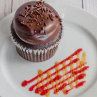 Chocoholic · Chocolate Cake with Chocolate Mousse frosting and chocolate glaze, drizzled with chocolate a...