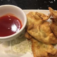 Cream Cheese Wonton · Imitation crab meat cheese celery ground and stuff in a wonton skin and deep-fry.