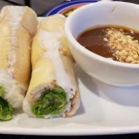 Tofu Spring Roll · Fry Tofu Wrapped With lettuce & Mints W/ a Fresh Rice Paper Wrap.