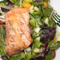 Grilled Salmon Salad · Mixed baby greens, Romaine lettuce and radicchio tossed with tomato, green apple, Dijon vina...