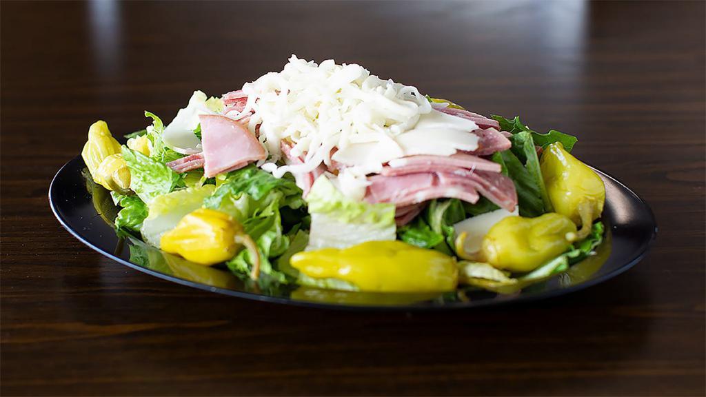 Antipasto Salad · Blend of fresh lettuce with a large portion of cotto salami, mortadella, ham, dry salami and provolone cheese and topped with pepperoncini.