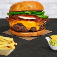 Cheesy Bacon Blast Burger · Beef patty, bacon, lettuce, tomato, onion, pickles, mayo, and melted cheddar cheese on a bri...