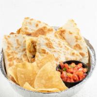 Quesadilla · 13 inch flour tortilla overflowing with cheese and your choice of protein and toppings. Also...