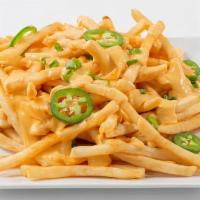 Cheese Fries · Fresh cut fries smothered in jalepeno cheese sauce.