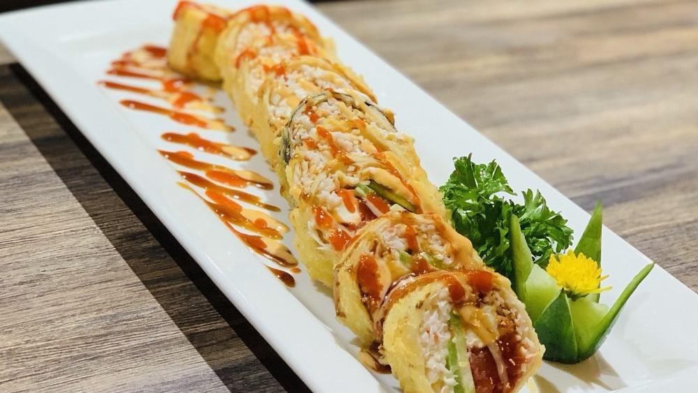 Rattle Snake Roll  · Spicy. in:Jalapene , cream cheese, crab meat, spicy tuna, wrap with tortilla, deep fried.
out:eel sauce, spicy mayo, sriracha hot sauce.