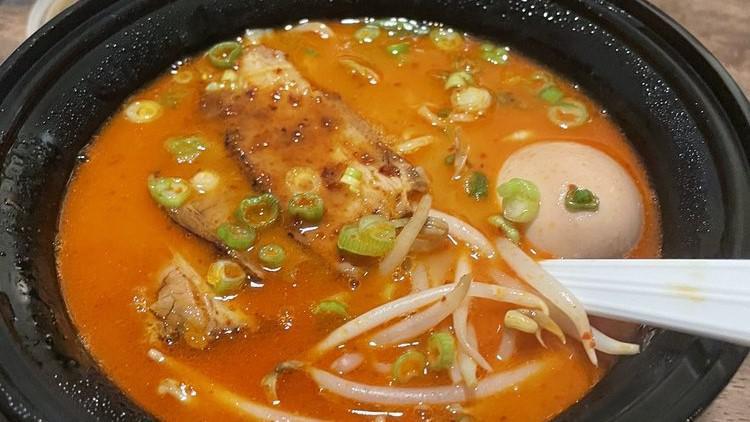 Spicy Tantanmen · Spicy. Sesame paste, Spicy broth, shredded spicy pork, chashu with fried garlic, marinated egg, bean sprouts, carrots, cabbage, green onion.