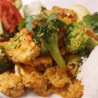Coco Curry · Coconut curry with soy chicken, bell pepper, onion, carrot, broccoli served with rice or ver...