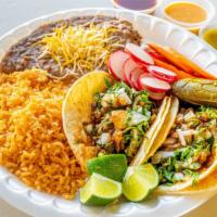 Tacos Combo, Any Meat. · Two tacos with rice and beans, one small soda or one can soda.