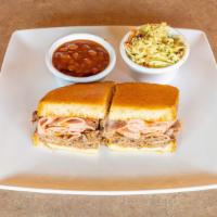 Bear Pit Special Sandwich · Combination sandwich with gobs of luscious, thinly sliced bar-b-q beef and ham served on our...