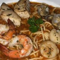 Cioppino Seafood Pasta · Pasta in tomato base served with Sea Bass, Scallops, Jumbo Shrimps, and Shellfish.