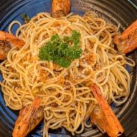 Grilled Shrimp With Garlic Noodles · Grilled shrimp, Parmesan, and pasta.