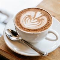 Cafe Mocha · Steamed milk, dark espresso with rich chocolate.