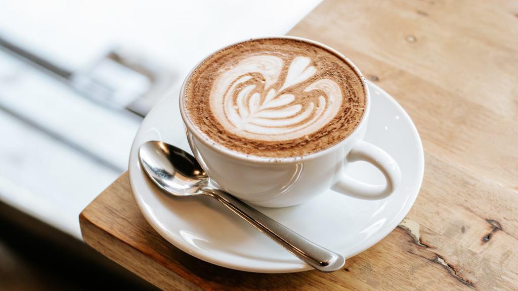 Cafe Mocha · Steamed milk, dark espresso with rich chocolate.