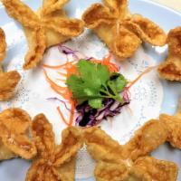 Crab Rangoons (8 Pieces) · Also known as cream cheese wontons. wonton skins stuffed with cream cheese, green & white on...