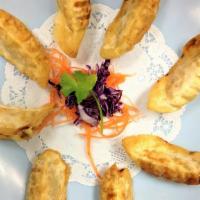 Fried Dumplings I Gyozas I (8 Pieces) · Wonton Skins stuffed with chicken & vegetables, served with ginger sauce.