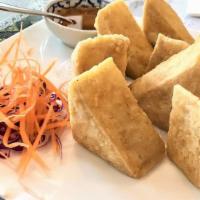 Tofu Delight (8 Pieces) · Deep fried firm tofu, served with plum sauce.