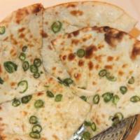 Chili Naan · Made with white flour and green chili and cilantro.