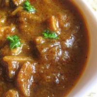 Mushroom Curry · Fresh mushrooms simmered in a curry sauce.