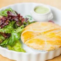 Pot Pie · Our classic Brazilian chicken pot pie with hearts of palm, olives and corn. Served with fres...