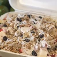 Bionico · A mix of papaya, cantaloupe, apple, strawberry, and banana topped with granola, coconut flak...