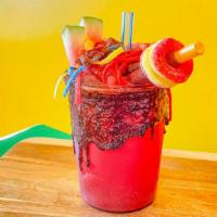 Michelagua (32Oz) · Agua fresca made with fresh ingredients topped with fruit, Mexican candy, and chamoy with ta...