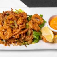 Calamari Fritti · A tender calamari lightly breaded and fried, served with a chipotle aioli sauce.
