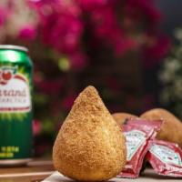 Chicken Coxinha · Traditional Brazilian dough filled with shredded chicken.