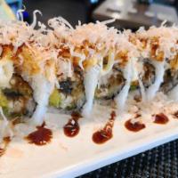 Meteor Rolls · Tempura fried eel, cream cheese, avocado, topped with spicy crab, kiniko and mayo seared wit...