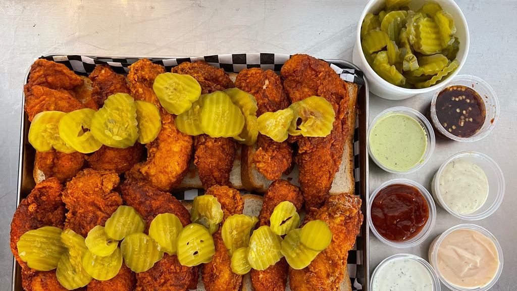 12-Pc Tenders · Includes 5 signature dipping sauce, white bread, and pickles.