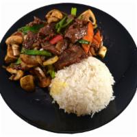 Mongolian Beef (Large) · Sliced beef with green onion, yellow onion, bell pepper, and mushroom in a sweet, savory bro...