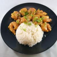Honey Sesame Shrimp · Crispy battered shrimp sauteed in a creamy, sweet sauce topped with sesame seeds. Served wit...