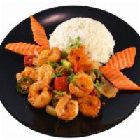 Dynasty Shrimp · Sweet, tangy shrimp braised in a ginger garlic sauce. Served with steamed rice.