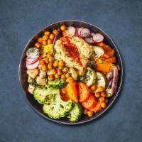 Veggie Plate Combination · Falafel, hummus, baba ghanouj, salad, grape leaves, tabouli and pita bread.