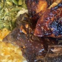 Short Beef Ribs · Fall off the bone chunky meaty ribs serve with our famous potato salad and macaroni and chee...