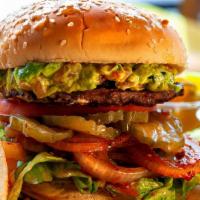 “Zapata“ Burger (¼ Lb) · Guacamole, grilled onions, chipotle sauce, lettuce, tomatoes, pickles and our special sauce.