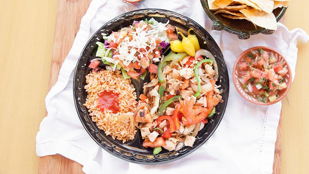 Picado Plate · Charbroiled skinless chicken breast or al pastor with grilled peppers, onions and tomatoes, served with five corn tortillas and two side orders.
