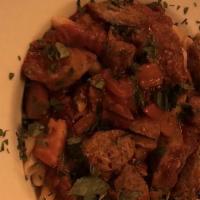 Penne Arrabbiata E Salsiccia · Sausage in spicy hot tomato sauce with Italian peppers.