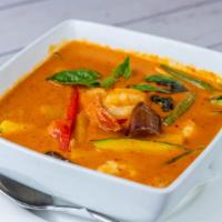 Red Curry · Spicy. Spicy red curry with coconut milk, string beans, eggplants, zucchini, bamboo shoots, ...